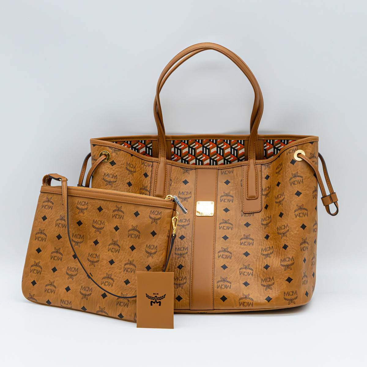 MCM Liz Wendeshopper Medium Visetos Cognac Shopper Tote Bag mit Pochette AVS19004