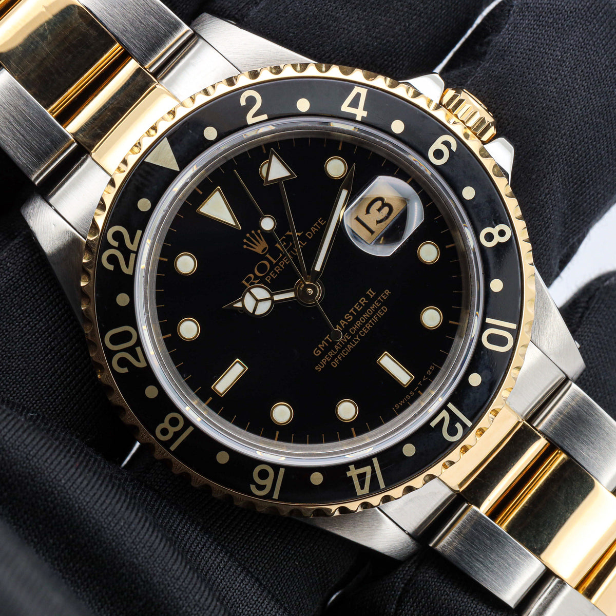 Rolex GMT-Master II 16713 Stahl/Gold Black Dial Sn. L...